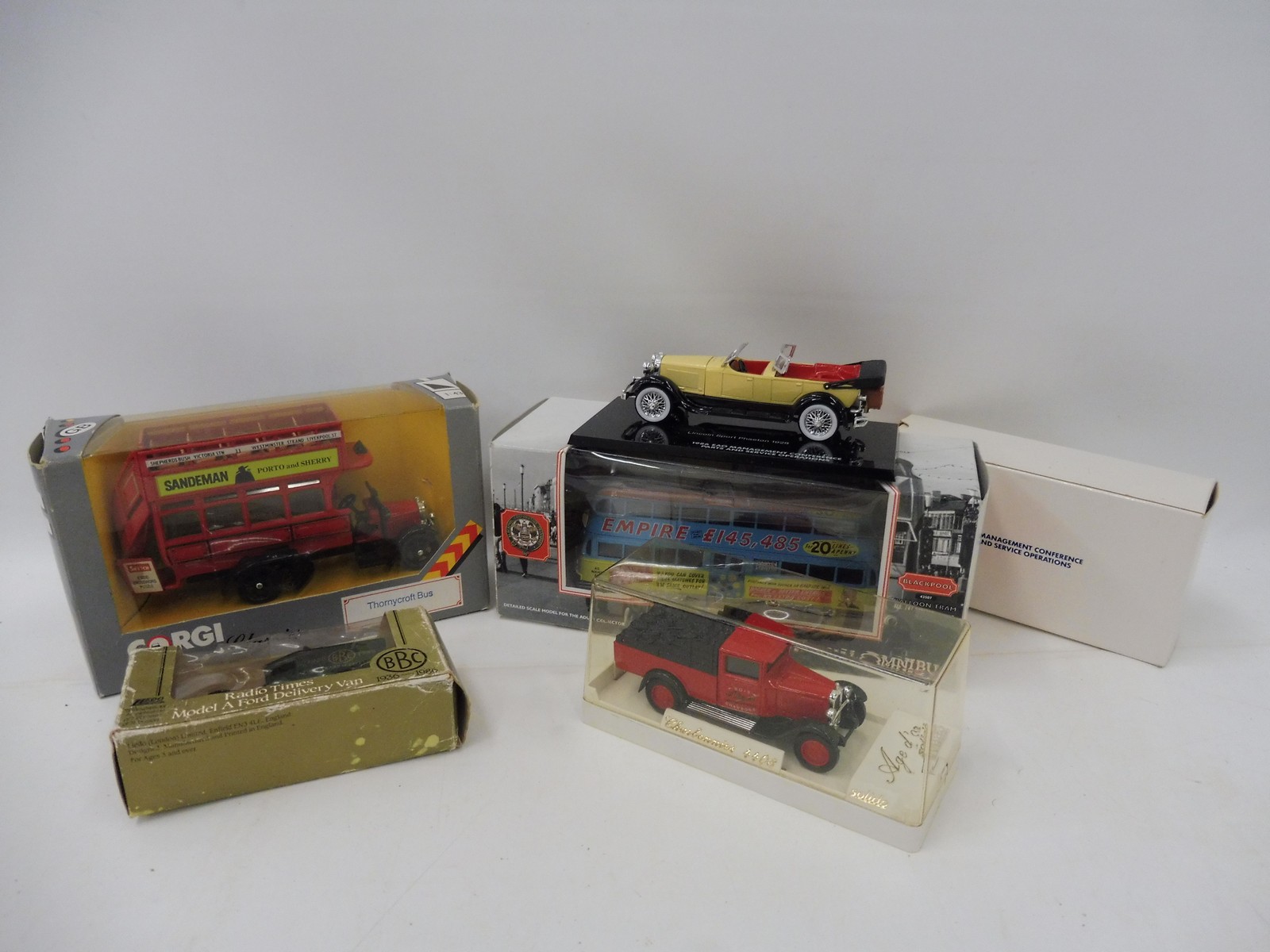 Five boxed and unused commercial vehicles from Corgi and Solido.