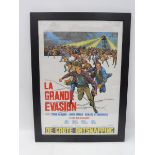 A framed and glazed cinema poster for the film The Great Escape, starring Steve McQueen, in very