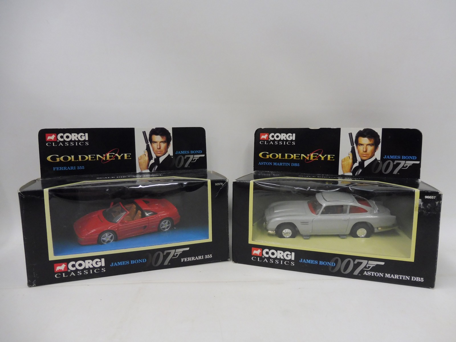 A Corgi James Bond 007 GoldenEye Aston Martin DB5 (96657) and Ferrari 355 (92978) set issued to