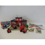 A Lego fire station set no. 6382, 1981 with instructions, plus a helicopter no. 6531, boxed with