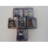 Six Dr Who Daleks.