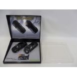 A Twin Scalextric James Bond 007 Aston Martin DB5 and Alfa Romeo 159 set as featured in the