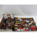 Two trays of assorted die-cast models.