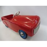 A Leeway tinplate pedal car.