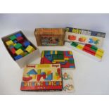 A Tri-ang Toys Building Bricks Set No. 2A, a Good-Wood Toys 'O' Tappit Set and a lock-a-blocks set