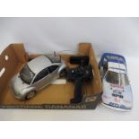 A Tamiya Toyota Celica GT 4WD Lombard rally car (electric), a Tamiya FWD new shape VW Beetle (
