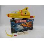 A John Rosenthal battery operated Thunderbird 4, box in all round excellent condition, contents