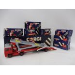 A mid-1980s Corgi set including a car transporter and seven vehicles, all individually boxed and