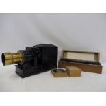 A magic lantern plus a collection of glass slides.