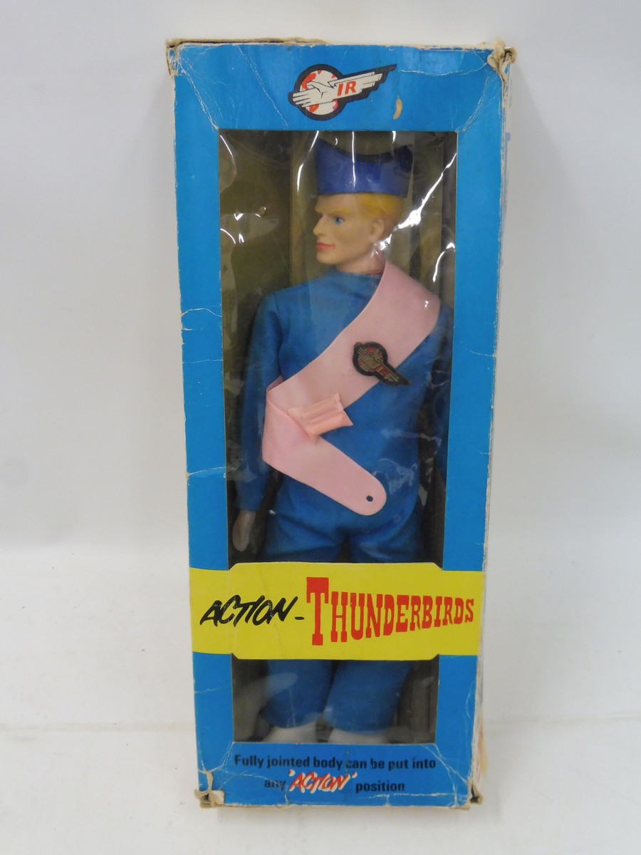 A very rare survival Thunderbird figure of John Tracy from Thunderbird 5, complete with badge and