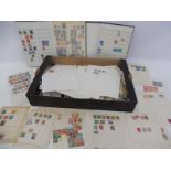 A box of assorted stamps.