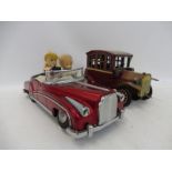 A Chinese tinplate open top American car plus a Japanese tinplate model of a vintage car.