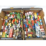 Two boxes of assorted die-cast models to include early Britains, Matchbox etc.