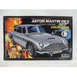 A Doyusha James Bond 007 Aston Martin DB5 Model Kit - a highly detailed and increasingly rare 1:20