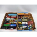 Two trays of Corgi die-cast vehicles to include a Chipperfield's Circus horse box and two horses.