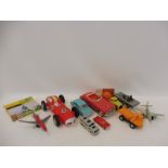 A tray of mixed early plastic and tinplate toys including a boxed Clifford Toys Low Flying Aircraft,