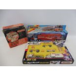 Three boxed Matchbox die-cast model sets to include The Nigel Mansell Collection Indy car set.