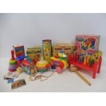 A group of mostly 1960s toys by Merit, rarely still boxed including Dandy Duck, Hammer Peg and Mr