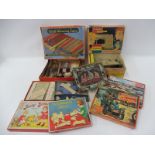 A selection of period games and toys to include 'Jolly School', 'Wee Wheel Toys'.