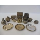 A collection of Oriental white metal, probably mostly silver including Matchbox case covers,