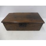 A 17th Century boarded bible box with punched heart decoration.