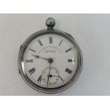 A silver pocket watch, Chester 1899, engraved to the white enamel dial: J.G. Graves, Sheffield.