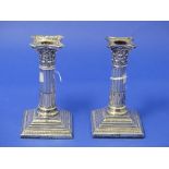 A pair of Edwardian silver Corinthian Column Candlesticks, hallmarked Sheffield, 1904, of