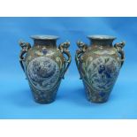 Lauder Barum pottery; a pair of Arts & Crafts pottery two-handled vases, of large baluster form,