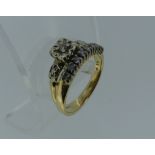 A small 14k yellow gold half hoop Ring, set with small diamond points, together with a small diamond