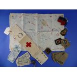 A WWII period British Army Medical Service Red Cross Armband, together with a BRCS VAD Mobile arm