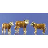 A set of three Saturno contemporary sterling silver and enamel brown Cows, largest 6.7cm long, two