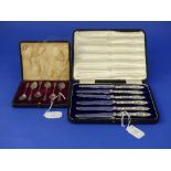 A cased set of six George V silver handled Cake Knives, hallmarked Sheffield, 1913, with silver