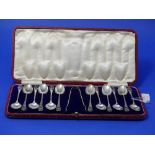 A cased set of twelve George V silver Teaspoons with Sugar Nips, by James Dixon & Son, hallmarked