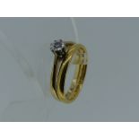 A 22ct yellow gold Wedding Band, 2.5g, Size H, together with a single stone diamond ring, mounted in