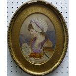 An early 19thC hand stitched oval needle work and painted silk Picture, depicting a woman,