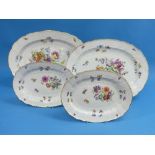 A set of four Meissen porcelain oval platters, with shaped rims and gilt-line decoration, moulded in