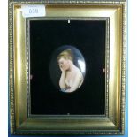 A continental porcelain oval plaque, "Making her Wish", depicting a young woman resting her head