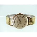 A Tudor Rolex gentleman's 9ct gold Wristwatch, the textured silvered dial with gilt Arabic