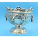 An Edwardian circular silver Bowl, hallmarked Birmingham, 1906, makers mark worn, with two lion mask