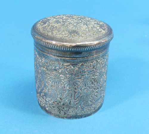 An Indian silver cylindrical Pot and Cover, the whole decorated with animals and birds amongst trees