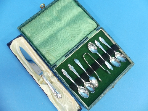 A cased set of six George VI silver Tea Spoons with Sugar Nips, by Cooper Brothers & Sons Ltd.,