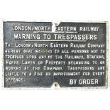 Railwayana; An L.N.E.R. cast iron Trespass Sign, small crack in bottom centre 17in (43cm) high, 26in