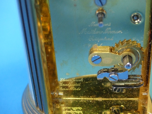 A 20thC gilt-brass oval Carriage Clock, of five-glass form, the white enamel dial with black Roman - Image 3 of 3