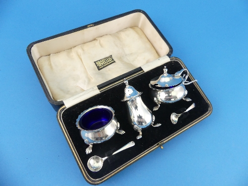 A cased George V silver three piece Cruet Set, by Barker Brothers Silver Ltd., hallmarked