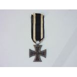 A W.W.1 German Iron Cross, 2nd Class, with framed citation dated 20.05.2017.