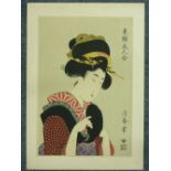 A pair of 19th century Japanese woodblock prints of Geisha, 15in x 10in (38cm x 25.25cm),