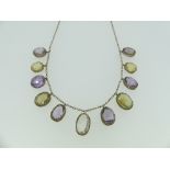A late Victorian harlequin Necklace, set with graduated oval facetted citrine and amethyst