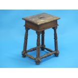 A 19th century Stool, the pierced rectangular seat with turned and carved supports joined by