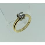 A diamond solitaire Ring, mounted in 18ct yellow gold, the diamond c.0.77ct, colour J-K, clarity