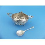 A Continental silver two handled Bowl, of shaped oval form, chased with scenes of cherubs and birds,